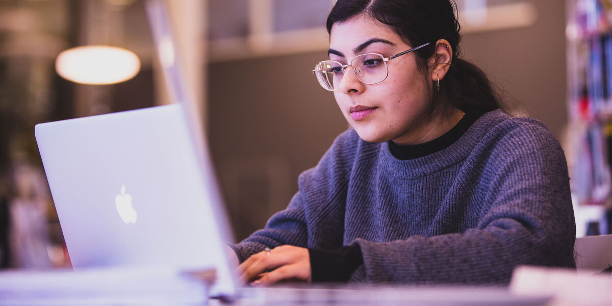 Glasgow Clyde College female student working on laptop