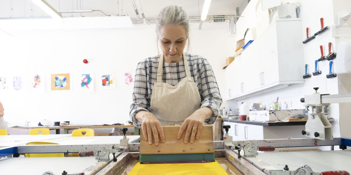 Female student screen printing