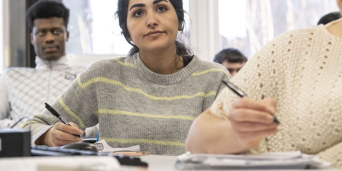 Woman taking notes 